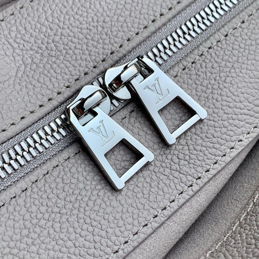 LOUIS VUITTON ONTHEGO EAST WEST BAG 25 IN BICOLOR MONOGRAM EMPREINTE LEATHER