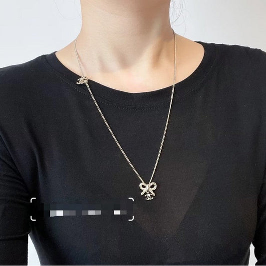 18K Chanel Gold Bow Tie Necklace
