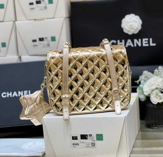 CHANEL 25S STAR GOLD 23 IN METALLIC GOLD CALFSKIN