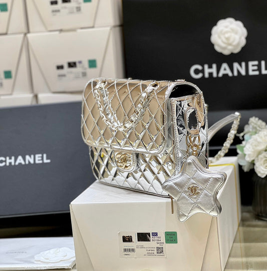 CHANEL 25S STAR SILVER 23 IN METALLIC SILVER CALFSKIN