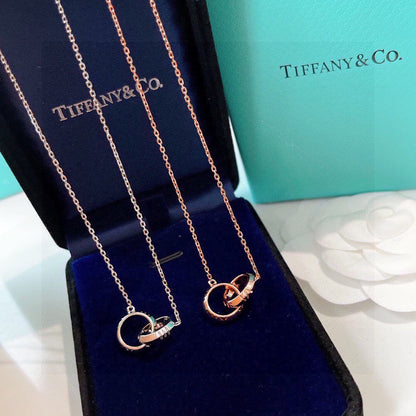 18K Tiffany Atlas X Closed Interlocking Pendant Necklace