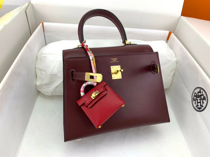 HERMES KELLY MINI 20 BAG IN WINE RED SMOOTH CALFSKIN WITH GOLD HARDWARE