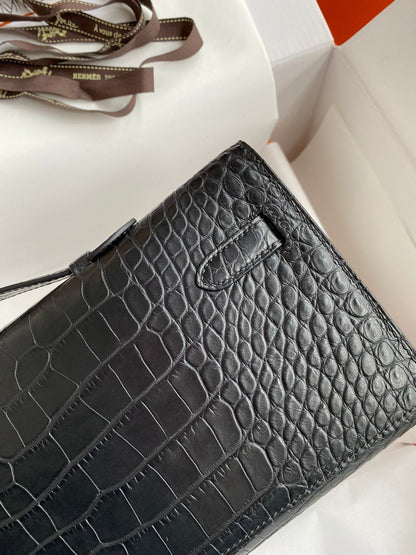 HERMES KELLY CUT 31 IN BLACK ALLIGATOR LEATHER WITH SILVER HARDWARE