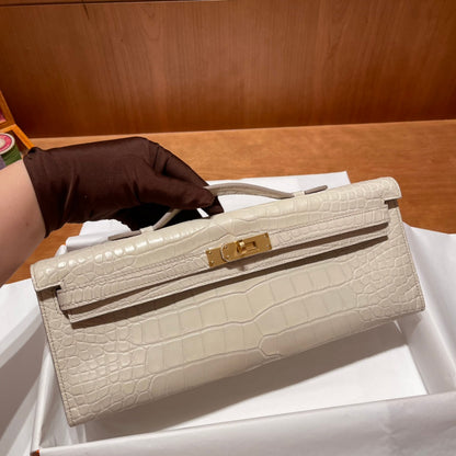 HERMES KELLY CUT 31 IN WHITE CREAM ALLIGATOR LEATHER WITH GOLD HARDWARE