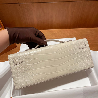 HERMES KELLY CUT 31 IN WHITE CREAM ALLIGATOR LEATHER WITH GOLD HARDWARE