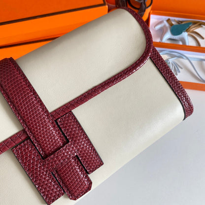 HERMES JIGE ELAN 29 CLUTCH IN WHITE CALFSKIN WITH GARNET RED LIZARD SKIN