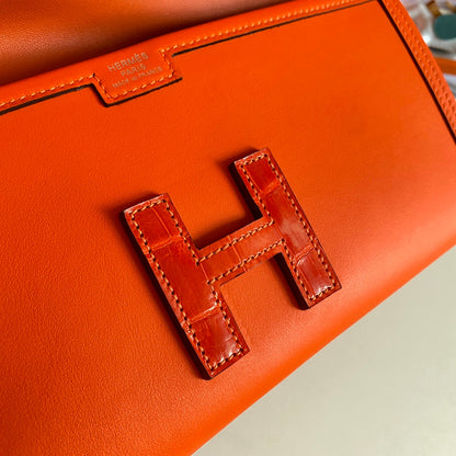 HERMES JIGE ELAN 29 CLUTCH IN BRIGHT ORANGE CALFSKIN WITH LIZARD SKIN