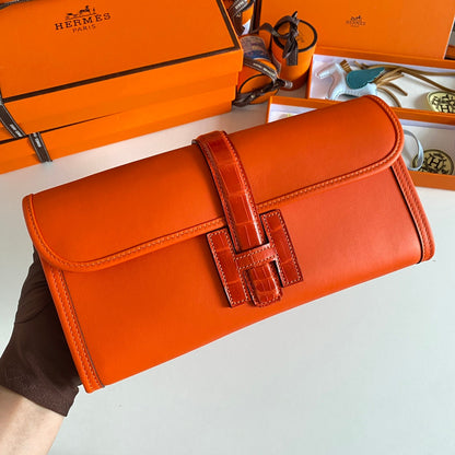 HERMES JIGE ELAN 29 CLUTCH IN BRIGHT ORANGE CALFSKIN WITH LIZARD SKIN