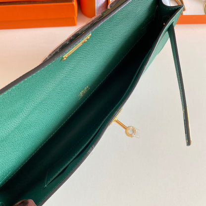 HERMES KELLY CUT 31 IN GREEN FOREST CALFSKIN WITH GOLD HARDWARE