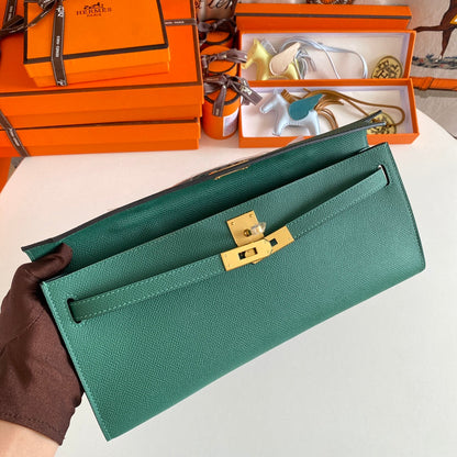 HERMES KELLY CUT 31 IN GREEN FOREST CALFSKIN WITH GOLD HARDWARE