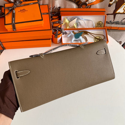 HERMES KELLY CUT 31 IN MOCHA BROWN CALFSKIN WITH GOLD HARDWARE