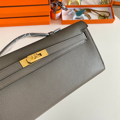 HERMES KELLY CUT 31 IN WOOD BROWN CALFSKIN WITH GOLD HARDWARE