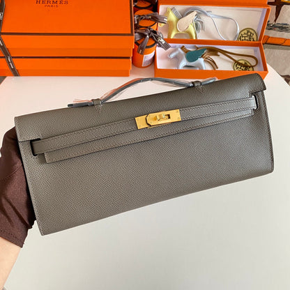 HERMES KELLY CUT 31 IN WOOD BROWN CALFSKIN WITH GOLD HARDWARE