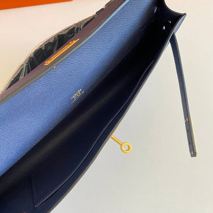 HERMES KELLY CUT 31 IN CLASSIC BLUE CALFSKIN WITH GOLD HARDWARE
