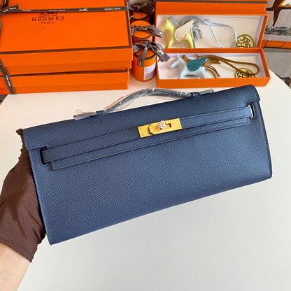 HERMES KELLY CUT 31 IN CLASSIC BLUE CALFSKIN WITH GOLD HARDWARE