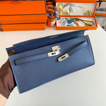 HERMES KELLY CUT 31 IN CLASSIC BLUE CALFSKIN WITH SILVER HARDWARE