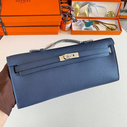HERMES KELLY CUT 31 IN CLASSIC BLUE CALFSKIN WITH SILVER HARDWARE