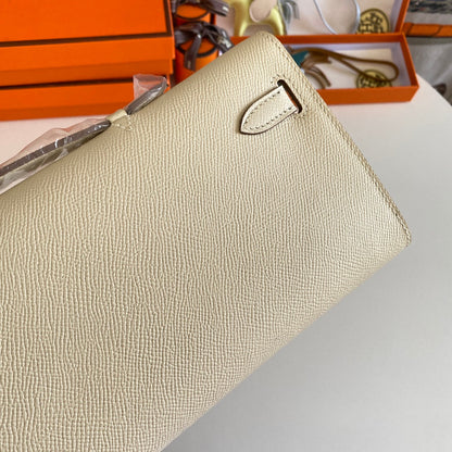 HERMES KELLY CUT 31 IN BEIGE CREAM CALFSKIN WITH GOLD HARDWARE