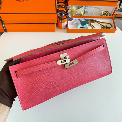 HERMES KELLY CUT 31 IN WATERMELON PINK CALFSKIN WITH SILVER HARDWARE