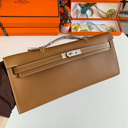 HERMES KELLY CUT 31 IN BRONZE BROWN CALFSKIN WITH SILVER HARDWARE