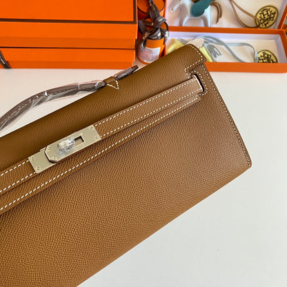 HERMES KELLY CUT 31 IN BRONZE BROWN CALFSKIN WITH SILVER HARDWARE
