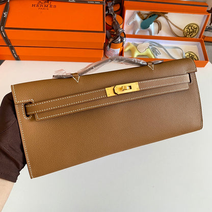 HERMES KELLY CUT 31 IN BRONZE BROWN CALFSKIN WITH GOLD HARDWARE