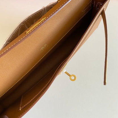 HERMES KELLY CUT 31 IN BRONZE BROWN CALFSKIN WITH GOLD HARDWARE