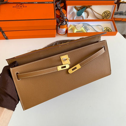 HERMES KELLY CUT 31 IN BRONZE BROWN CALFSKIN WITH GOLD HARDWARE