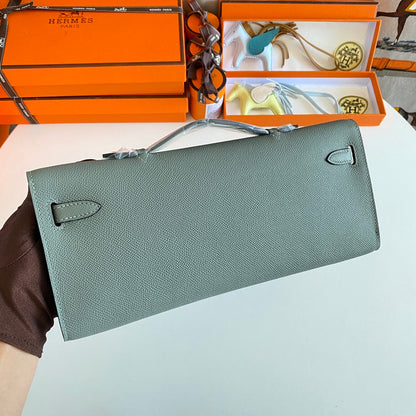 HERMES KELLY CUT 31 IN SEAFOAM GREEN CALFSKIN WITH SILVER HARDWARE