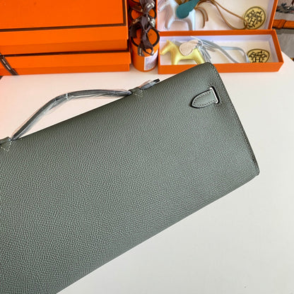 HERMES KELLY CUT 31 IN SEAFOAM GREEN CALFSKIN WITH SILVER HARDWARE