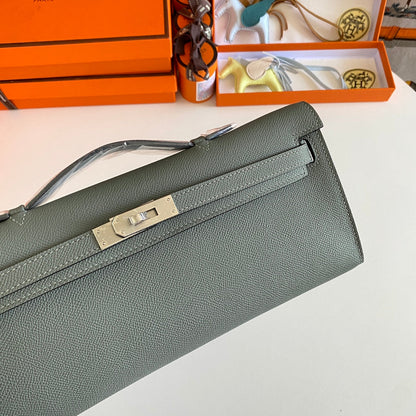 HERMES KELLY CUT 31 IN SEAFOAM GREEN CALFSKIN WITH SILVER HARDWARE