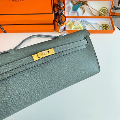 HERMES KELLY CUT 31 IN SEAFOAM GREEN CALFSKIN WITH GOLD HARDWARE