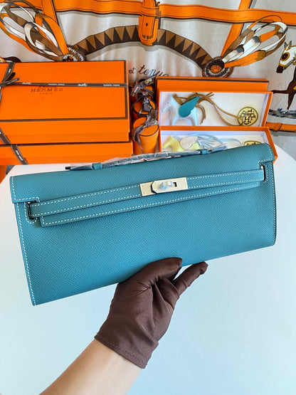 HERMES KELLY CUT 31 IN AZURE BLUE CALFSKIN WITH SILVER HARDWARE