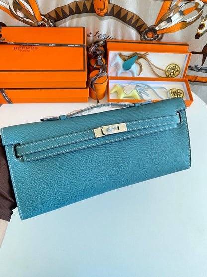 HERMES KELLY CUT 31 IN AZURE BLUE CALFSKIN WITH SILVER HARDWARE