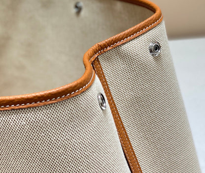 HERMES GARDEN PARTY 36CM IN WHITE TOILETS COTTON CANVAS AND BROWN CALFSKIN