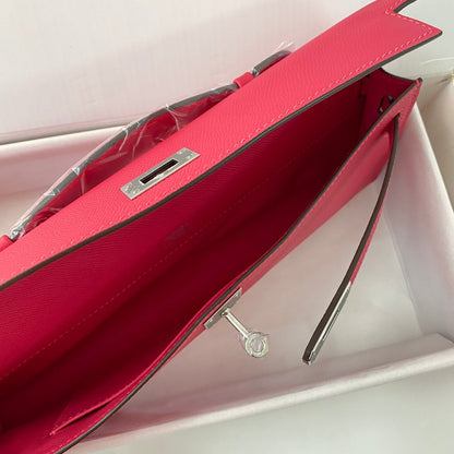 HERMES KELLY CUT 31 IN CHERRY RED CALFSKIN WITH SILVER HARDWARE