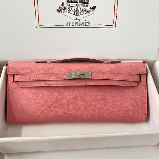 HERMES KELLY CUT 31 IN SALMON PINK CALFSKIN WITH SILVER HARDWARE