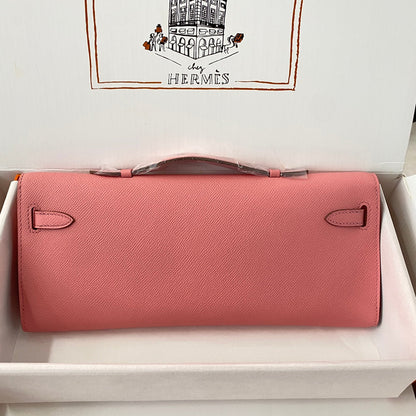 HERMES KELLY CUT 31 IN SALMON PINK CALFSKIN WITH SILVER HARDWARE