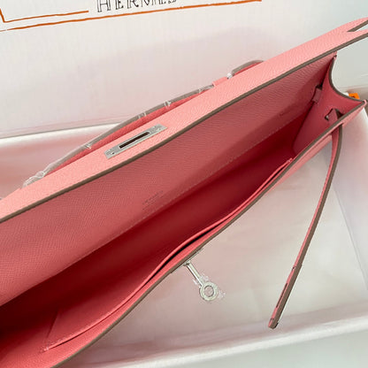 HERMES KELLY CUT 31 IN SALMON PINK CALFSKIN WITH SILVER HARDWARE