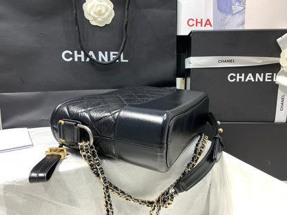 CHANEL HOBO BAG 25 WITH STRAP IN BLACK CALFSKIN GOLD AND SILVER HARDWARE