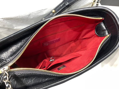 CHANEL HOBO BAG 25 WITH STRAP IN BLACK CALFSKIN GOLD AND SILVER HARDWARE