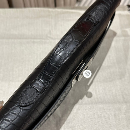 HERMES KELLY CUT 31 IN BLACK SHINY ALLIGATOR LEATHER WITH SILVER HARDWARE