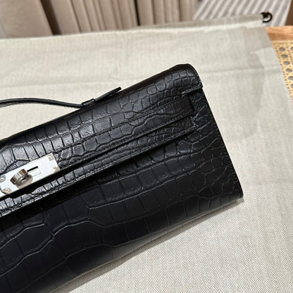 HERMES KELLY CUT 31 IN BLACK SHINY ALLIGATOR LEATHER WITH SILVER HARDWARE