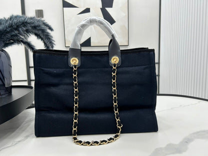 CHANEL DEAUVILLE LARGE 38 TOTE BAG IN BLACK CANVAS WITH GOLD EMBROIDERED LOGO