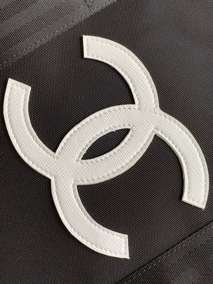 CHANEL TRAVEL BAG 45 IN BLACK CANVAS WITH WHITE LOGO