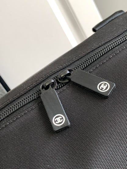 CHANEL TRAVEL BAG 45 IN BLACK CANVAS WITH WHITE LOGO