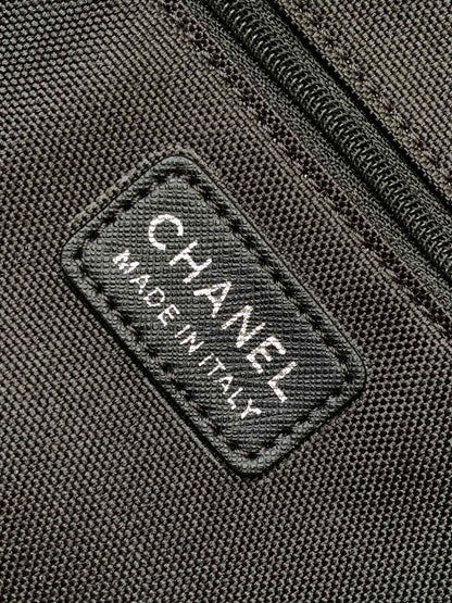 CHANEL TRAVEL BAG 45 IN BLACK CANVAS WITH WHITE LOGO