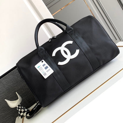 CHANEL TRAVEL BAG 45 IN BLACK CANVAS WITH WHITE LOGO