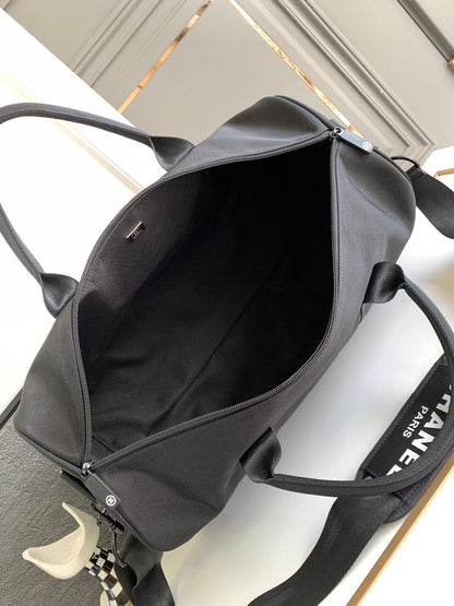 CHANEL TRAVEL BAG 45 IN BLACK CANVAS WITH WHITE LOGO
