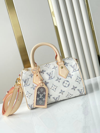 LOUIS VUITTON SPEEDY BANDOULIÈRE 20 IN WHITE MONOGRAM JACQUARD FABRIC AND BEIGE CALFSKIN TRIM